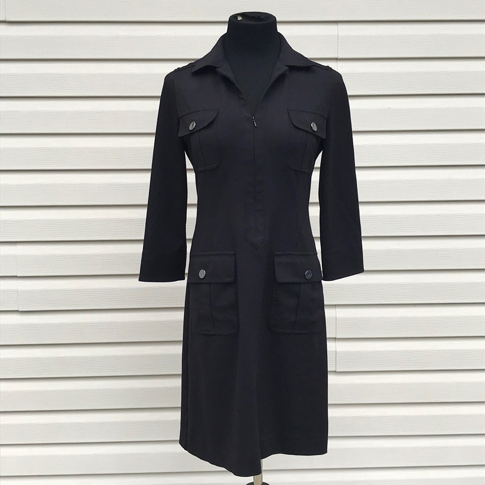Etcetera black dress with pockets in front.